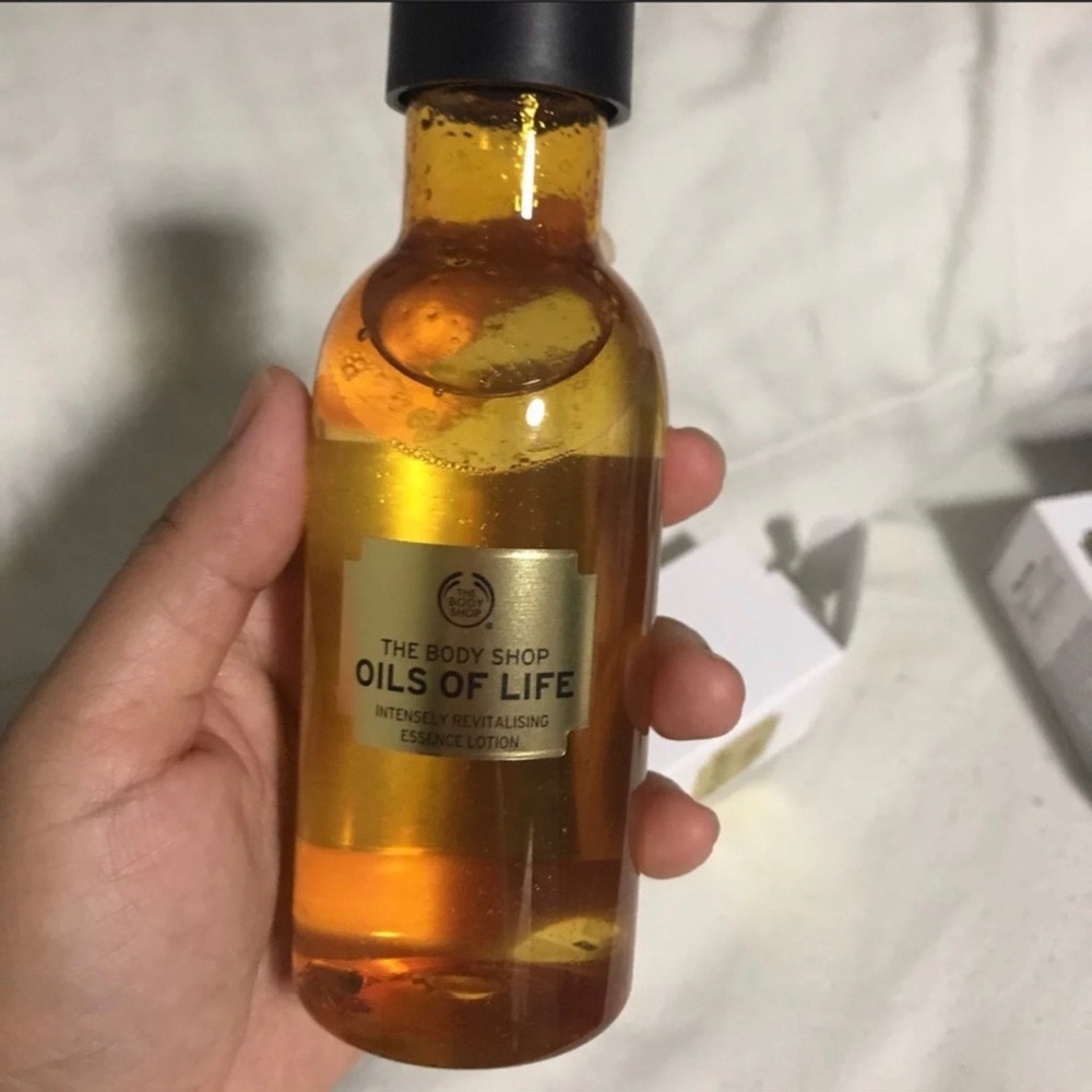 The body shop oils of life essence lotion 5.4 oz